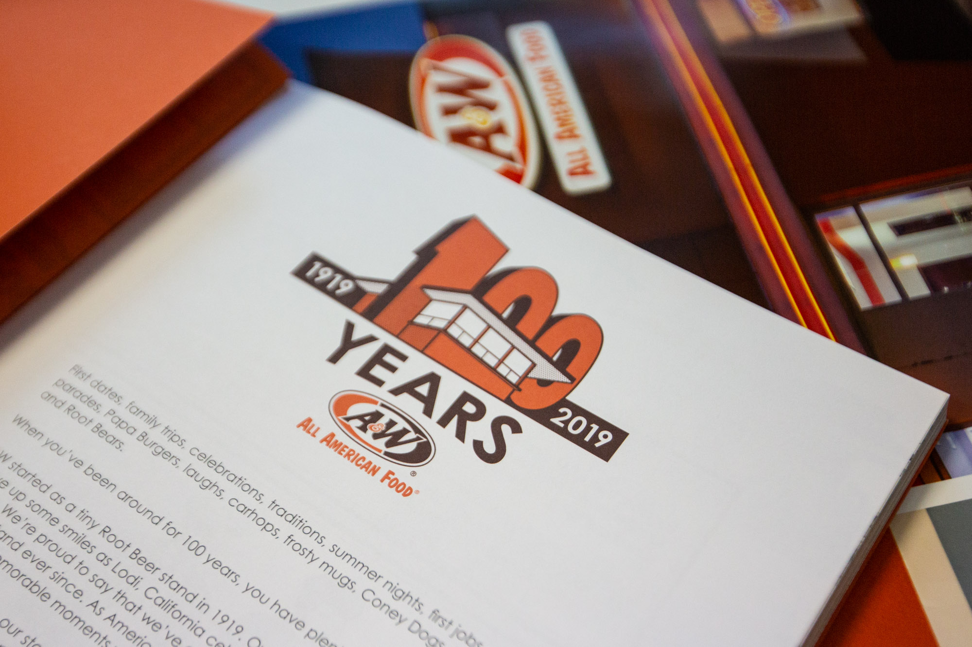 First page of A&W 100th Anniversary Book featuring 100th Anniversary Logo and text