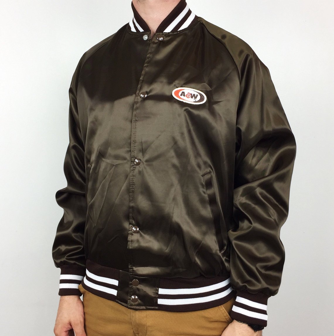 Vintage black nylon bomber jacket with A&W Restaurants logo patch